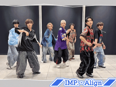 A Group Of Young Men Are Dancing In Front Of A Wall That Says Imp-Align On It GIF
