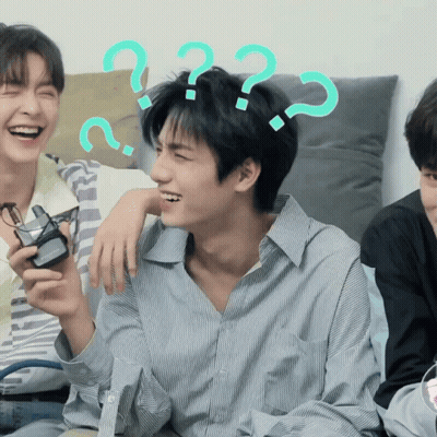 A Group Of Young Men Are Laughing With Question Marks Around Their Heads GIF
