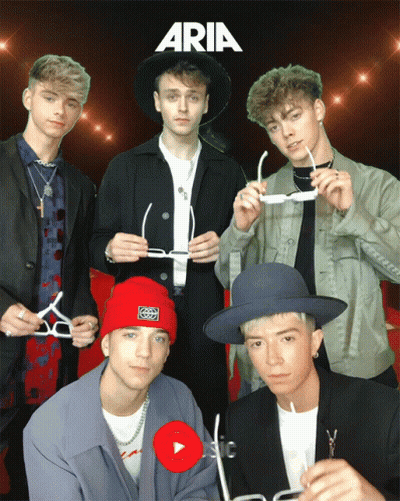 A Group Of Young Men Are Posing For A Photo With Aria Written On The Top GIF