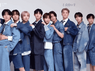 A Group Of Young Men Are Posing For A Picture And The Words Hybe Are On The Bottom GIF