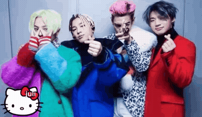 A Group Of Young Men Are Posing For A Picture With A Hello Kitty . GIF