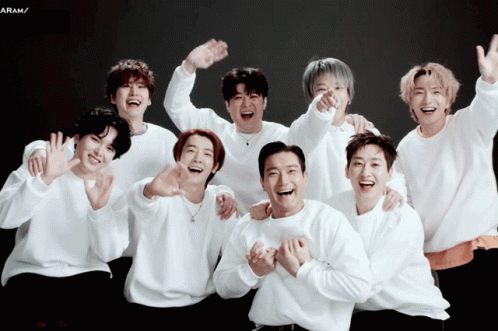 A Group Of Young Men Are Posing For A Picture With The Word Aram Visible In The Corner GIF