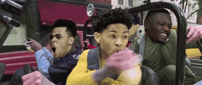 A Group Of Young Men Are Riding In A Car With Their Mouths Open . GIF