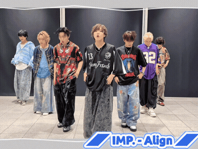 A Group Of Young Men Are Standing In Front Of A Wall With The Words Imp-Align On The Bottom Right GIF