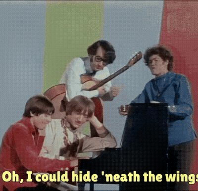 A Group Of Young Men Playing Instruments With The Words Oh I Could Hide Neath The Wings GIF