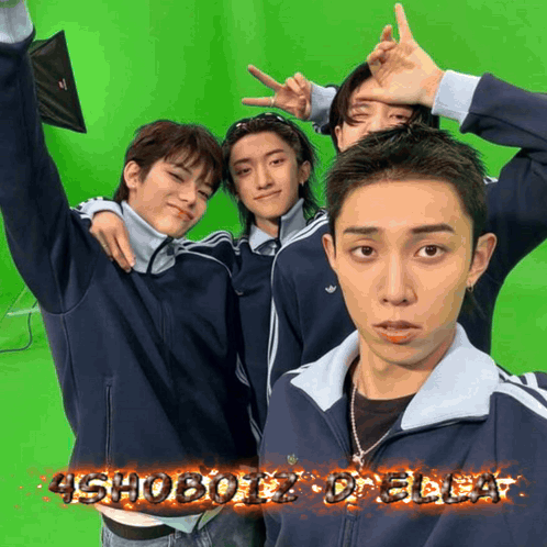 A Group Of Young Men Pose In Front Of A Green Screen With The Words 45H0botz On The Bottom GIF