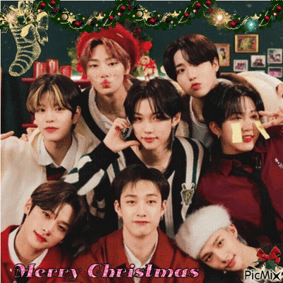 A Group Of Young Men Posing For A Picture With The Words Merry Christmas Written On The Bottom GIF