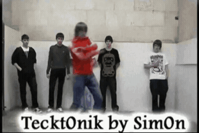 A Group Of Young Men Standing In Front Of A Wall With The Words Tecktonik By Simon GIF