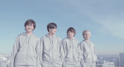 A Group Of Young Men Wearing Nike Sweatshirts Stand In A Row GIF