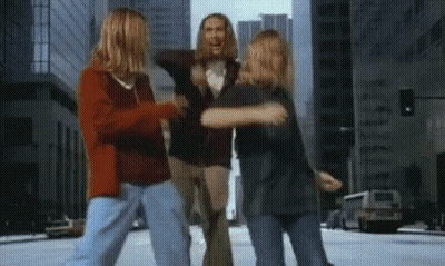 A Group Of Young People Are Dancing On A City Street GIF