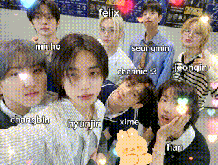 A Group Of Young People Are Posing For A Picture With Felix In The Center GIF