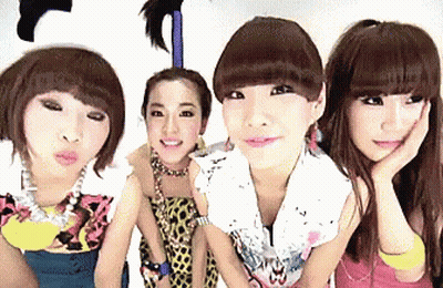 A Group Of Young Women Are Posing For A Picture And One Of Them Has Her Hand On Her Chin GIF