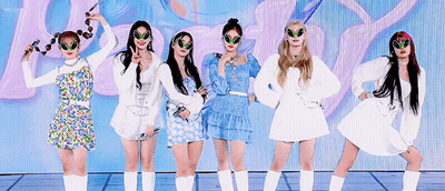 A Group Of Young Women Wearing Alien Glasses Are Standing Next To Each Other . GIF