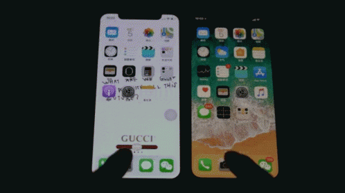 A Gucci Phone Is Next To An Iphone GIF