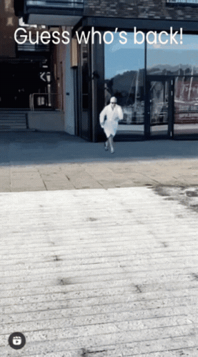 A Guess Who 'S Back Advertisement With A Man In A Bathrobe GIF