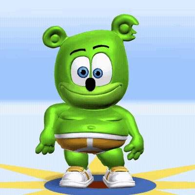 A Gummy Bear With Blue Eyes Is Standing On A Blue And Yellow Circle GIF