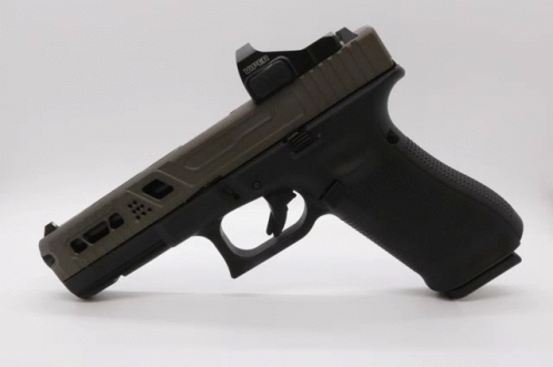 A Gun With A Red Dot Sight That Says ' Glock ' On It GIF