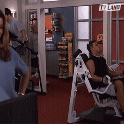 A Gym With A Sign That Says Tv Land GIF