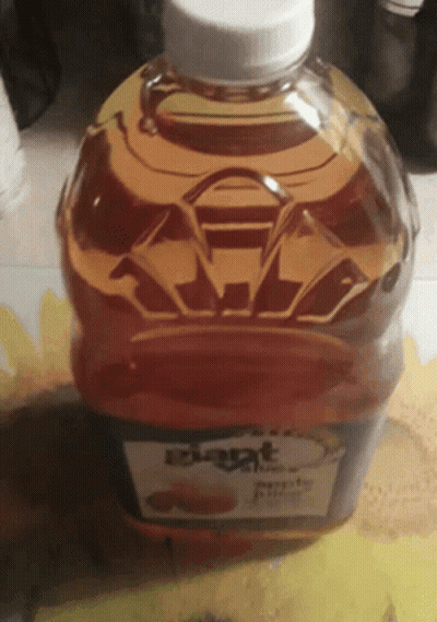 A Half Gallon Bottle Of Iowa Maple Syrup GIF