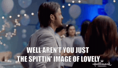 A Hallmark Channel Advertisement Shows A Man And A Woman Dancing GIF