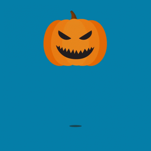 A Halloween Pumpkin With A Smiling Face And Black Teeth GIF