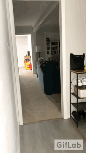 A Hallway With A Giflab Watermark On The Bottom Right GIF