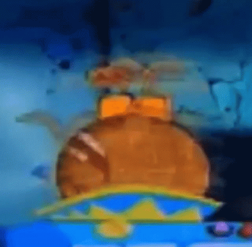 A Hamburger With A Crown On Top Of It Is Sitting On Top Of A Blue Table . GIF