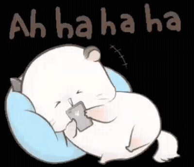 A Hamster Is Laying On A Pillow Holding A Cell Phone And Laughing . GIF