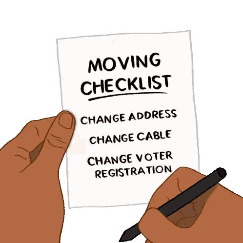 A Hand Holding A Piece Of Paper That Says Moving Checklist Sticker