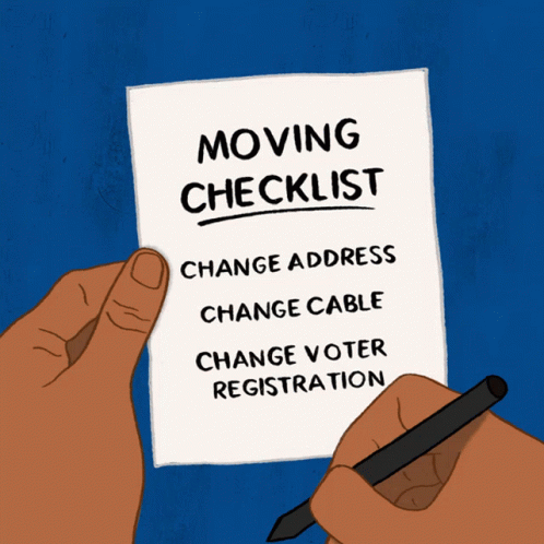A Hand Holding A Piece Of Paper That Says Moving Checklist GIF