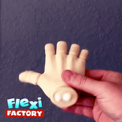 A Hand Is Being Held In Front Of A Flexi Factory Sign GIF