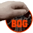 A Hand Is Holding A Circle With The Word Bog In Red Sticker