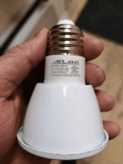 A Hand Is Holding A Light Bulb That Says " Arani " On It GIF