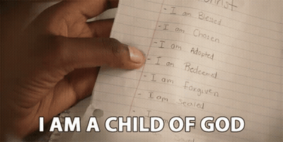 A Hand Is Holding A Piece Of Paper With The Words I Am A Child Of God On It GIF