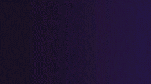 A Hand Is Holding A Tablet That Has The Word Mini On It GIF