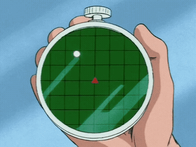 A Hand Is Holding A Watch That Shows A Red Triangle On The Screen GIF