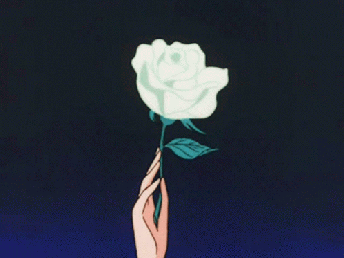 A Hand Is Holding A White Rose With A Blue Stem GIF