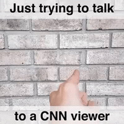 A Hand Pointing At A Brick Wall With The Words Just Trying To Talk To A Cnn Viewer GIF