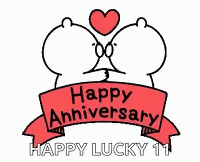 A Happy Anniversary Greeting Card With Two Bears Kissing Each Other And A Heart . GIF