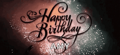 A Happy Birthday Amy Sign With Fireworks Behind It GIF