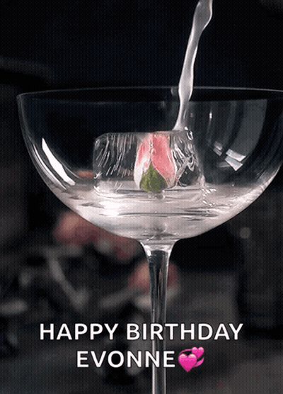 A Happy Birthday Evonne Card With A Martini Being Poured Into It GIF