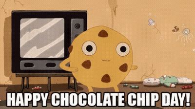 A Happy Chocolate Chip Day Cartoon With A Cookie Standing In Front Of A Television GIF
