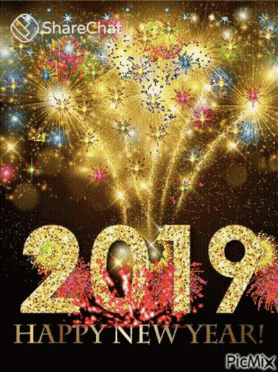 A Happy New Year Greeting Card With Fireworks Behind The Numbers 2019 GIF