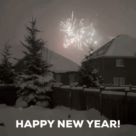 A Happy New Year Greeting Card With Fireworks Displayed In The Background GIF