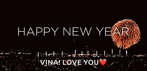 A Happy New Year Greeting With Fireworks Displayed In The Background GIF