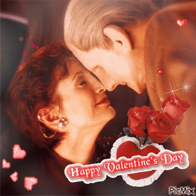 A Happy Valentine 'S Day Greeting Card With A Couple Kissing GIF