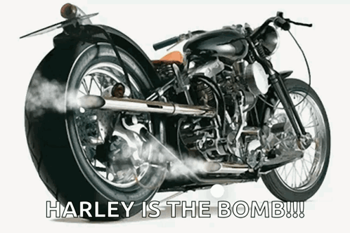 A Harley Davidson Motorcycle With Smoke Coming Out Of The Tail GIF