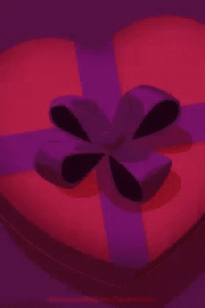 A Heart Shaped Box Of Chocolates With I Love You Written On Them GIF