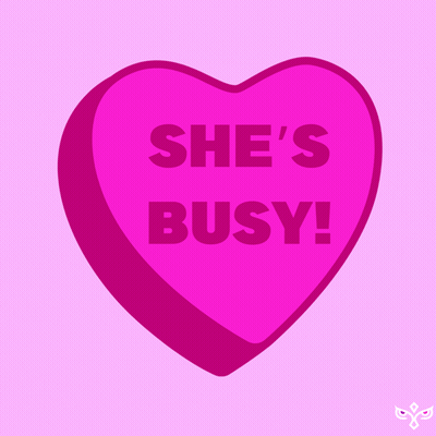 A Heart Shaped Candy That Says She 'S Busy GIF