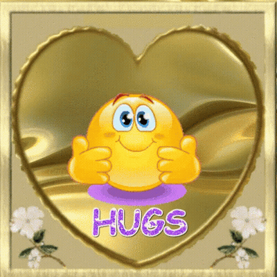 A Heart Shaped Frame With A Smiley Face And The Words Hugs On It GIF